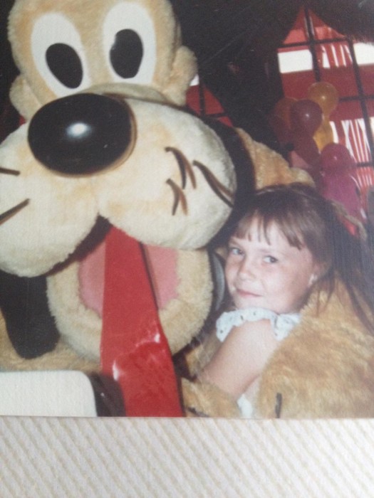 Me with Pluto circa 1984, when he still had whiskers and a tongue.